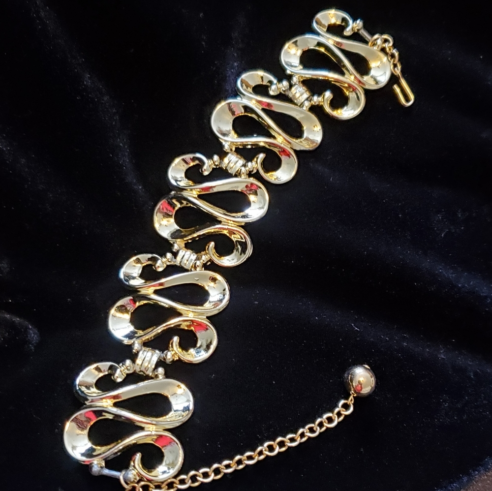 Goldtone S link adjustable wide bracelet